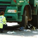a police officer at the scene where a cyclist was knocked down 01