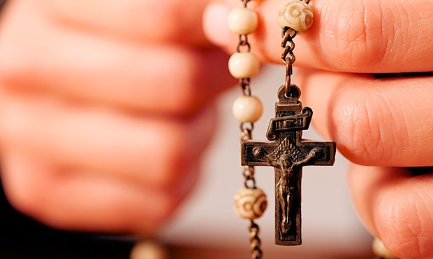 Catholic woman holding a 011