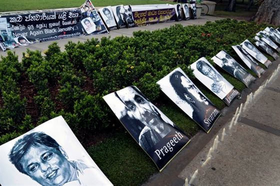 epa05116157 Placards exibited of several killed or disappeared colleagues during a protest titled ?Black January? in Colombo, Sri Lanka 21 January 2016. The journalists held the protest to remember a series of attacks against journalists during the month of January in recent years.  EPA/M.A.PUSHPA KUMARA