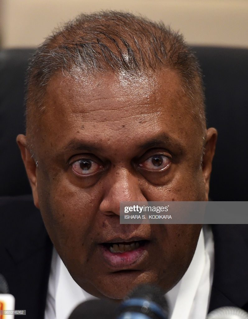 Sri Lankas Finance Minister Mangala Samaraweera addresses a press conference in Colombo on May 22, 2018, to warn of the country's increasing foreign debt repayments. - Samaraweera blamed blamed a series of costly projects commissioned by the previous government for record-high repayments that will reach a record of $2.84 billion this year and hit $4.28 billion in 2019. (Photo by ISHARA S.  KODIKARA / AFP)        (Photo credit should read ISHARA S.  KODIKARA/AFP/Getty Images)