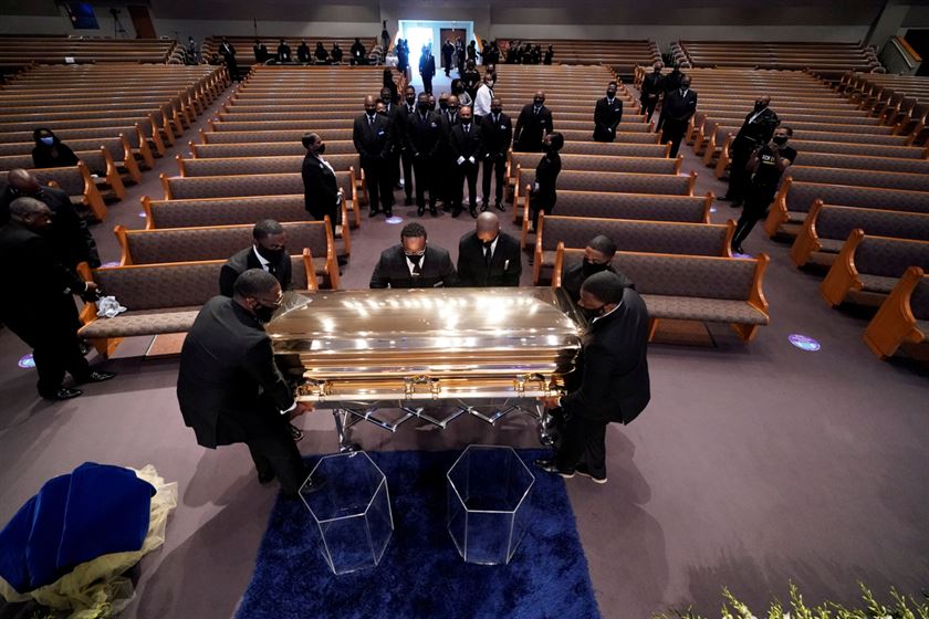 The casket of George Floyd is placed in the chapel during a funeral service for Floyd at the Fountain of Praise church, in Houston